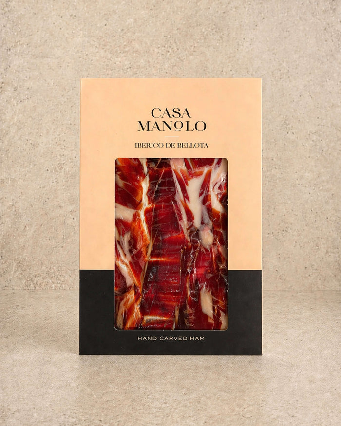 Iberico Bellota Ham 100g - Hand Carved from Casa Manolo, premium Spanish cured ham prepared for easy serving
