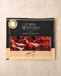 100% Pata Negra Ham 100g from Casa Manolo, premium Spanish cured ham prepared for easy serving