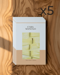 Artisan Manchego extra-matured cheese slices in a 5× saving pack, highlighting rich texture and quality.