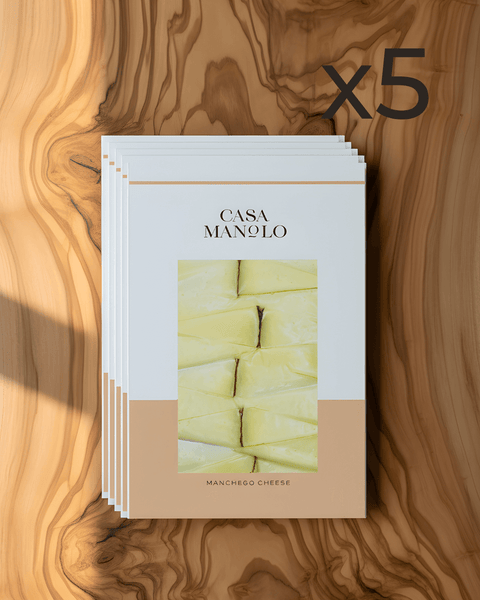 Artisan Manchego extra-matured cheese slices in a 5× saving pack, highlighting rich texture and quality.