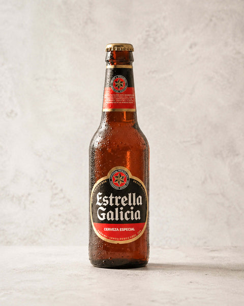 Estrella Galicia from Casa Manolo, Spanish beer bottle ready to serve chilled
