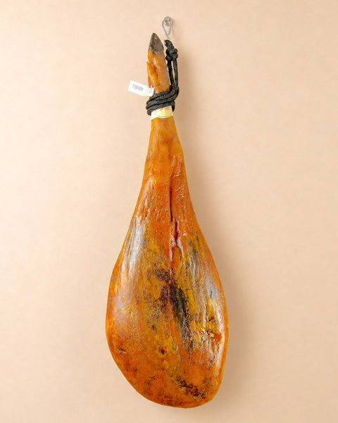Iberico Cebo Ham from Casa Manolo, premium Spanish cured ham prepared for easy serving
