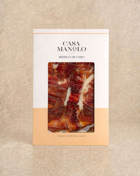 Iberico Cebo Ham 100g - Hand Carved from Casa Manolo, premium Spanish cured ham prepared for easy serving