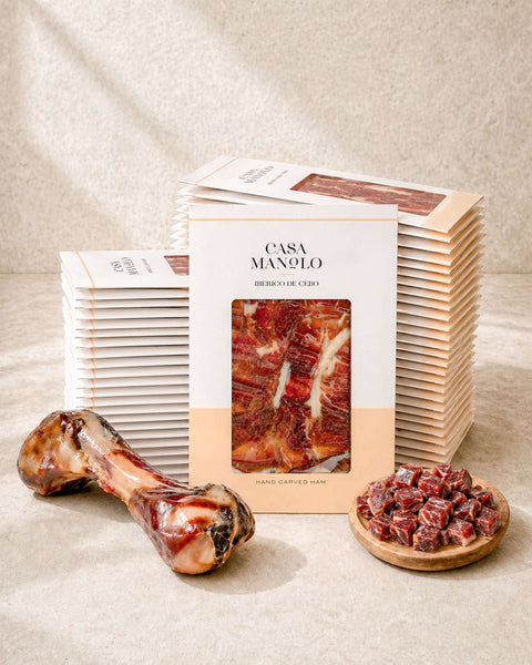 Iberico Cebo Master Hand Sliced Whole Leg Set - 35 Packs, Bone & Cubes from Casa Manolo, premium Spanish food gift set for hosting or gifting