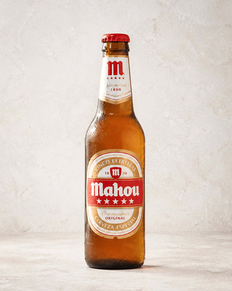 Mahou Cinco Estrellas from Casa Manolo, Spanish beer bottle ready to serve chilled
