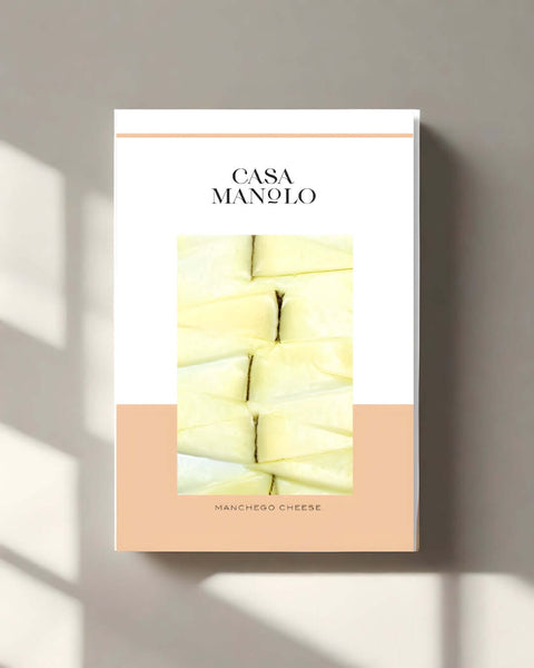 Manchego extra-matured cheese slices in a beautifully designed packaging from Casa Manolo.