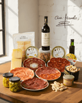 Iberian Tapas Feast Set featuring meats, cheeses, olives, nuts, and Ribera del Duero wine for an authentic Spanish dining experience