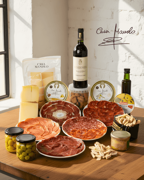 Iberian Tapas Feast Set featuring meats, cheeses, olives, nuts, and Ribera del Duero wine for an authentic Spanish dining experience